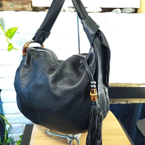 Gucci Handbags - RARE Gucci Leather Bag with Bamboo and leather tassel detailing